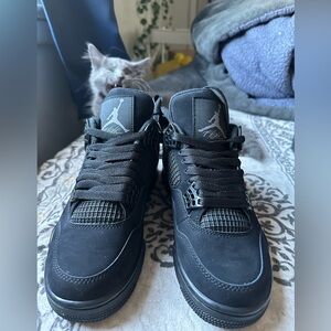 Jordan 4 black cats. Size 7 men all black shoe. Brand new with box